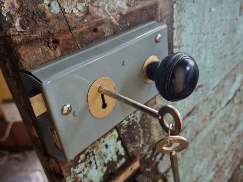 keys hanging from a door lock after being fixed by a locksmith in codsall
